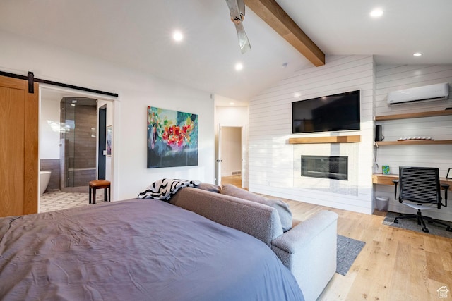 5972 S Ragsdale Dr, Murray, UT 84121 - bedroom featuring a wall mounted AC, light wood-style flooring, a fireplace, recessed lighting, and ensuite bath