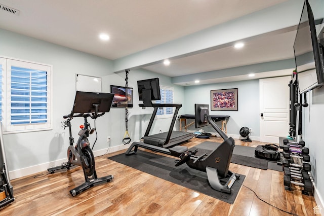 5972 S Ragsdale Dr, Murray, UT 84121 - workout area with wood finished floors, recessed lighting, and baseboards