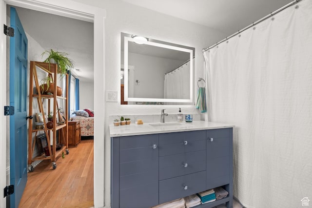 1503 S 300 E, Salt Lake City, UT 84115 - full bath with wood finished floors and vanity