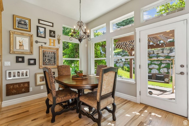 603 S Temple Hill Cir E, Bountiful, UT 84010 - dining room with a chandelier, baseboards, and light wood-type flooring