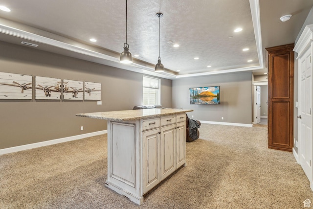 603 S Temple Hill Cir E, Bountiful, UT 84010 - kitchen featuring light colored carpet, recessed lighting, a raised ceiling, baseboards, and a kitchen island