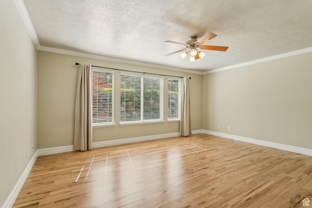 603 S Temple Hill Cir E, Bountiful, UT 84010 - spare room featuring a textured ceiling, ceiling fan, light wood finished floors, ornamental molding, and baseboards