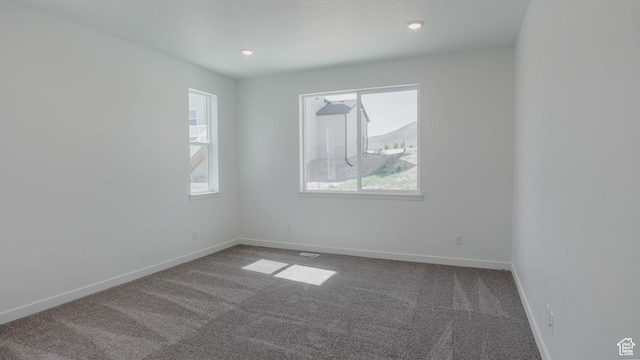 891 W Fallow Dr Unit 211, Saratoga Springs, UT 84045 - unfurnished room with carpet flooring and recessed lighting
