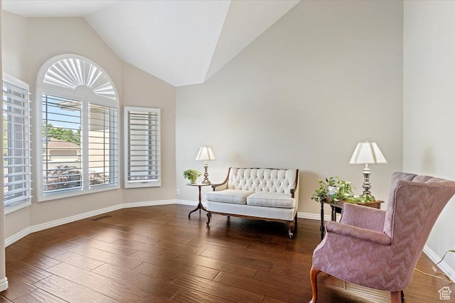 938 E Bernay Cir, Sandy, UT 84094 - living area featuring wood finished floors, baseboards, and high vaulted ceiling