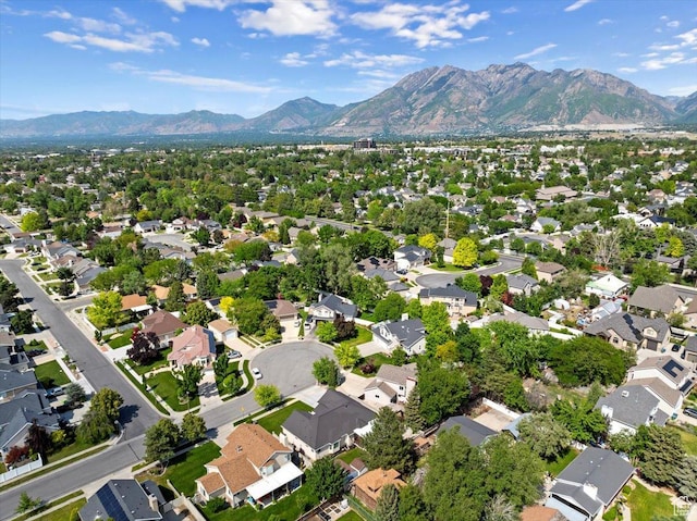 938 E Bernay Cir, Sandy, UT 84094 - aerial view of property and surrounding area featuring a mountainous background and nearby suburban area