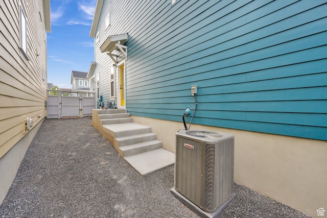 11693 S Watercourse Rd, South Jordan, UT 84009 - view of patio / terrace with central AC and a gate