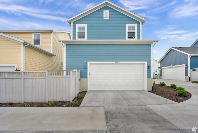 11693 S Watercourse Rd, South Jordan, UT 84009 - view of front of property featuring concrete driveway and a garage