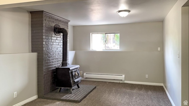 230 S 700 W, Price, UT 84501 - miscellaneous room featuring baseboard heating, a wood stove, carpet, and baseboards