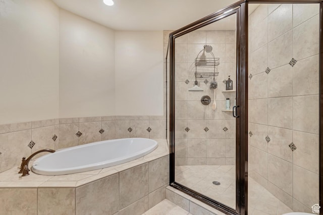 7259 S Viansa Ct, Midvale, UT 84047 - bathroom featuring a bath, a stall shower, and recessed lighting