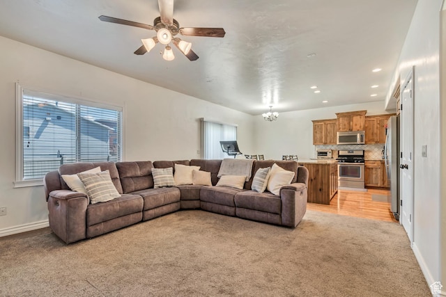 7259 S Viansa Ct, Midvale, UT 84047 - living area featuring light colored carpet, a ceiling fan, a chandelier, recessed lighting, and baseboards