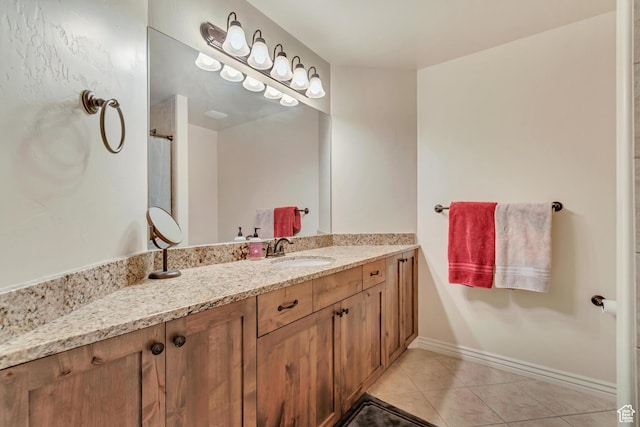 7259 S Viansa Ct, Midvale, UT 84047 - bathroom with tile patterned flooring, vanity, and baseboards