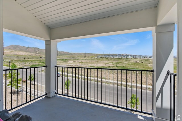 972 W Spider Green Way N Unit E302, Saratoga Springs, UT 84045 - balcony with a mountain view and a rural view