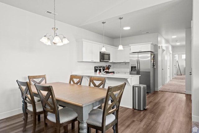 972 W Spider Green Way N Unit E302, Saratoga Springs, UT 84045 - dining room featuring dark wood-type flooring, baseboards, a chandelier, and recessed lighting
