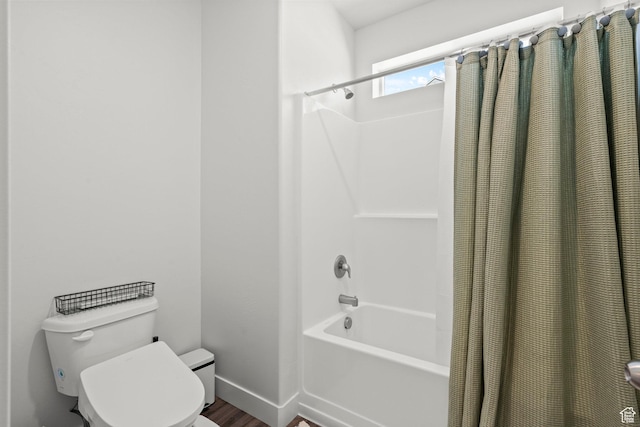 972 W Spider Green Way N Unit E302, Saratoga Springs, UT 84045 - full bathroom featuring shower / bath combo, toilet, wood finished floors, and baseboards