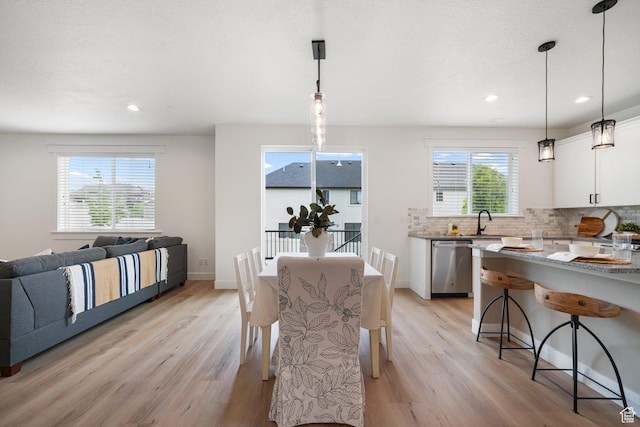 512 W Kit Fox Dr Unit 616, Saratoga Springs, UT 84045 - dining area with light wood-style floors, recessed lighting, and baseboards