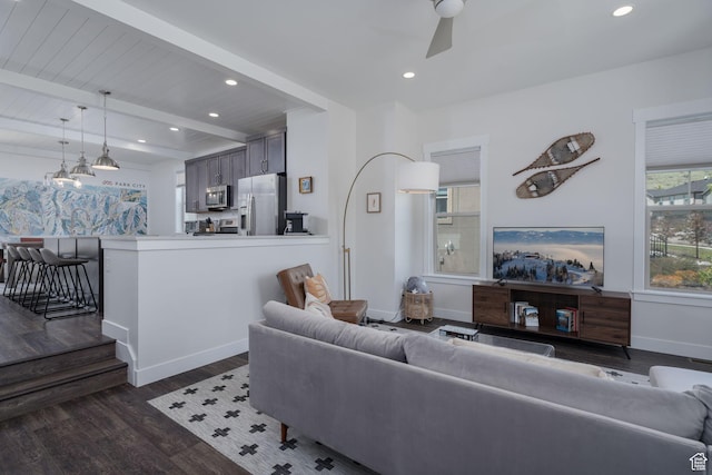 1097 W Wasatch Spring Rd, Kamas, UT 84036 - living room with dark wood-type flooring, beamed ceiling, recessed lighting, baseboards, and a ceiling fan