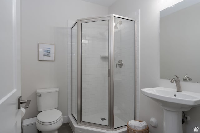 1097 W Wasatch Spring Rd, Kamas, UT 84036 - bathroom with toilet, a shower stall, and a sink