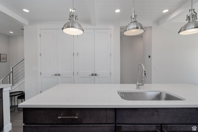 1097 W Wasatch Spring Rd, Kamas, UT 84036 - kitchen with a sink, light countertops, recessed lighting, decorative light fixtures, and wood ceiling with exposed beams