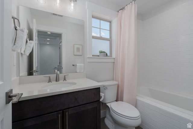 1097 W Wasatch Spring Rd, Kamas, UT 84036 - bathroom with vanity, toilet, and tiled shower / bath