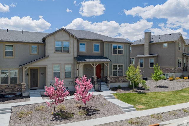 1097 W Wasatch Spring Rd, Kamas, UT 84036 - view of front of property with board and batten siding and stone siding
