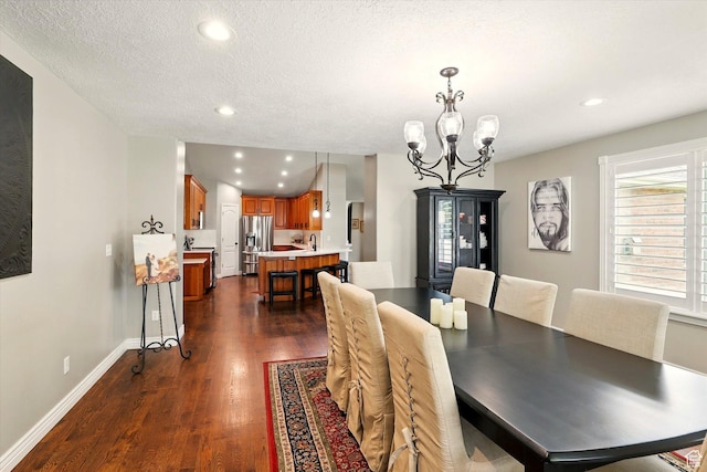 774 W 2300 S, Syracuse, UT 84075 - dining space with dark wood finished floors, a chandelier, recessed lighting, baseboards, and a textured ceiling