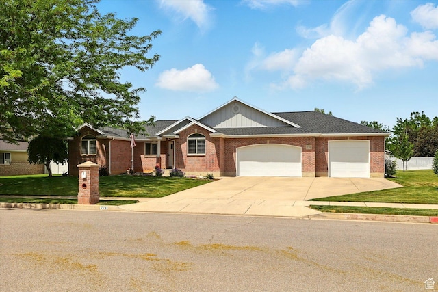 774 W 2300 S, Syracuse, UT 84075 - ranch-style house featuring driveway, a front yard, a garage, and brick siding