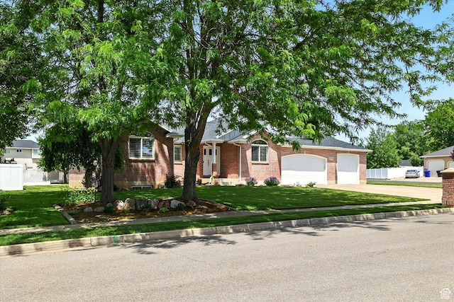 774 W 2300 S, Syracuse, UT 84075 - single story home featuring driveway, brick siding, and a garage