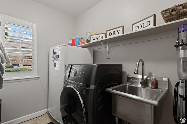 5284 W Orchard Spring Dr S, Herriman, UT 84096 - laundry area featuring washer / dryer, tile patterned floors, and baseboards