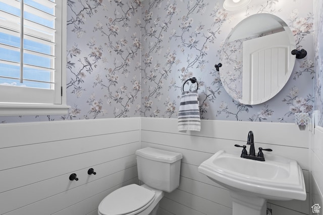 5284 W Orchard Spring Dr S, Herriman, UT 84096 - bathroom with wallpapered walls, wainscoting, toilet, and a sink