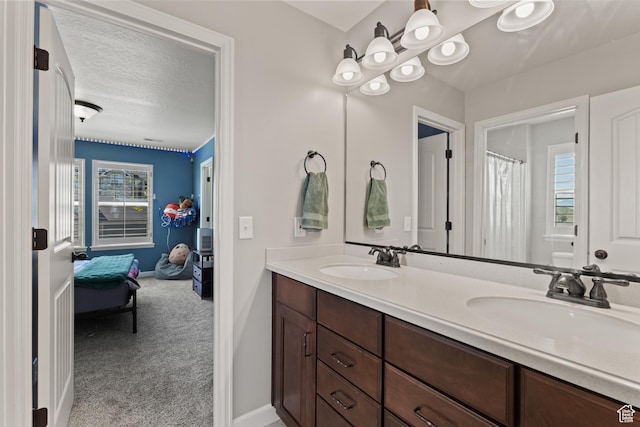 5284 W Orchard Spring Dr S, Herriman, UT 84096 - full bathroom featuring double vanity, baseboards, a shower with shower curtain, and a textured ceiling