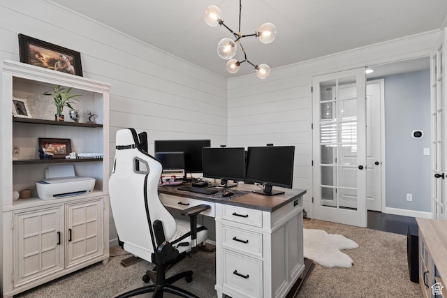5284 W Orchard Spring Dr S, Herriman, UT 84096 - home office with a chandelier, ornamental molding, dark carpet, wooden walls, and french doors