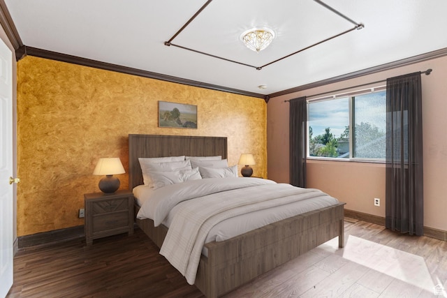 773 W 1280 S, Provo, UT 84601 - bedroom with crown molding, an accent wall, baseboards, wood finished floors, and a chandelier