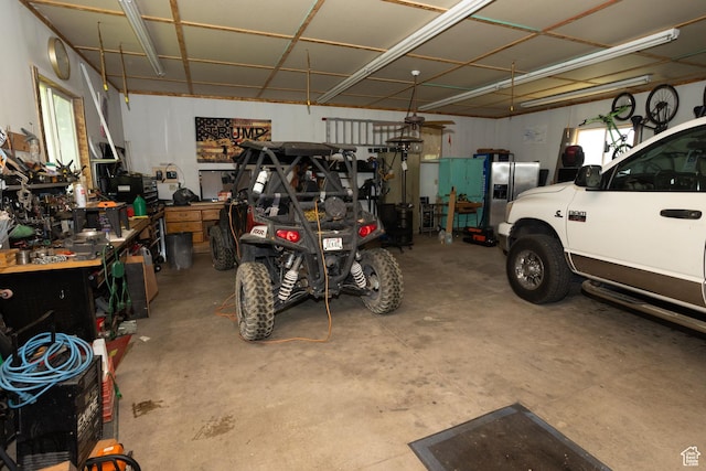 40 S Main St, Glenwood, UT 84730 - garage featuring stainless steel refrigerator with ice dispenser