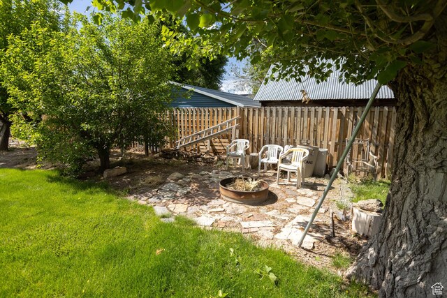 40 S Main St, Glenwood, UT 84730 - view of yard featuring a fire pit and a patio area