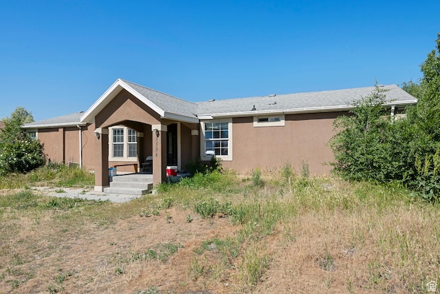 2554 S Chesterfield St W, West Valley City, UT 84119 - rear view of house with stucco siding