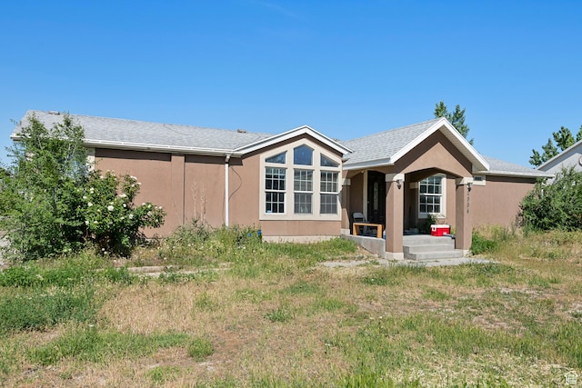 2554 S Chesterfield St W, West Valley City, UT 84119 - rear view of house with stucco siding