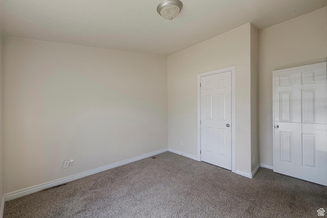 2554 S Chesterfield St W, West Valley City, UT 84119 - unfurnished bedroom with carpet floors and baseboards