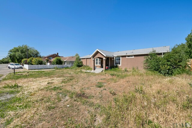 2554 S Chesterfield St W, West Valley City, UT 84119 - rear view of house with stucco siding