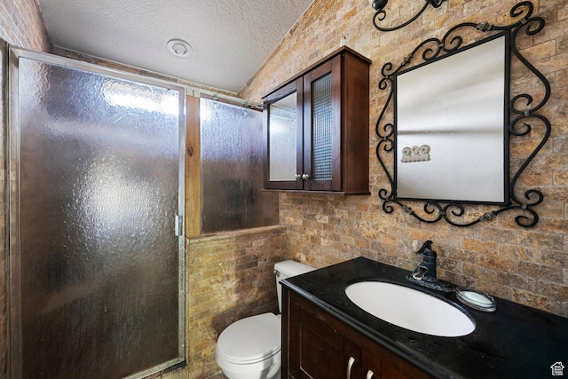 2554 S Chesterfield St W, West Valley City, UT 84119 - full bath with toilet, vanity, a stall shower, and a textured ceiling