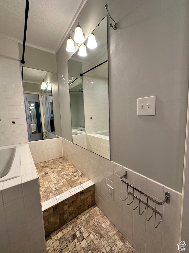 241 N Vine St W Unit 808W, Salt Lake City, UT 84103 - full bathroom with tile walls and ornamental molding