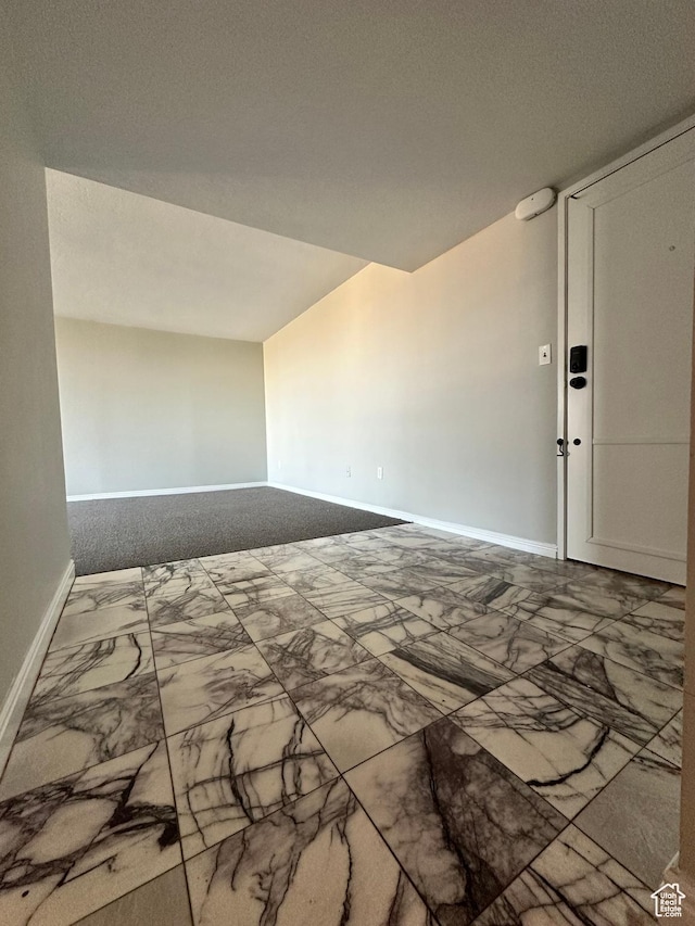 241 N Vine St W Unit 808W, Salt Lake City, UT 84103 - empty room featuring marble look tiles and baseboards