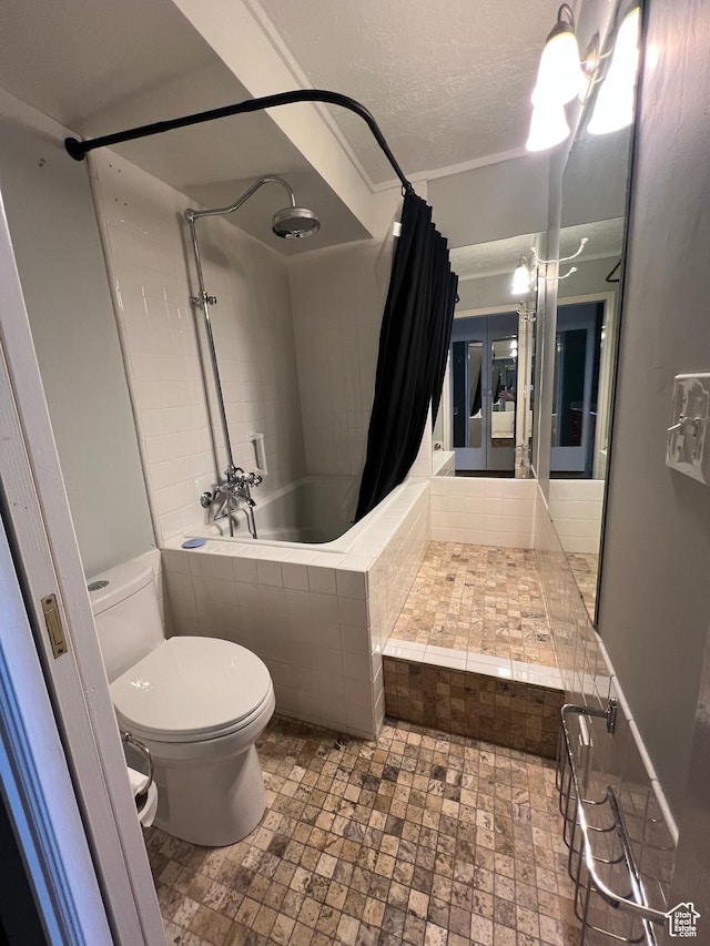 241 N Vine St W Unit 808W, Salt Lake City, UT 84103 - bathroom featuring toilet and tiled shower / bath