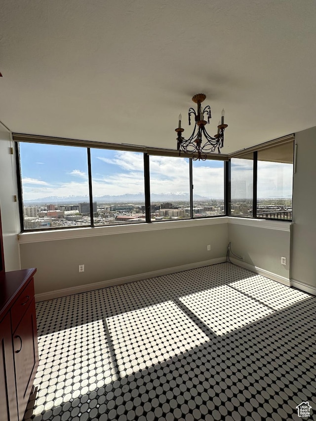 241 N Vine St W Unit 808W, Salt Lake City, UT 84103 - unfurnished sunroom featuring a chandelier