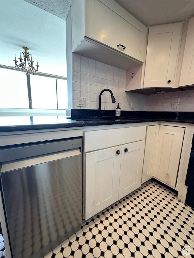 241 N Vine St W Unit 808W, Salt Lake City, UT 84103 - kitchen with dishwasher, backsplash, dark countertops, and a sink