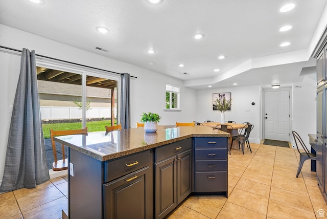 993 E 12600 S, Draper, UT 84020 - kitchen featuring a center island, light tile patterned floors, recessed lighting, and dark stone counters