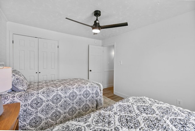 993 E 12600 S, Draper, UT 84020 - bedroom with wood finished floors, a closet, ceiling fan, and baseboards