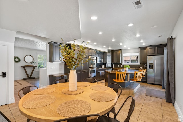 993 E 12600 S, Draper, UT 84020 - dining space featuring recessed lighting, light tile patterned floors, healthy amount of natural light, and baseboards