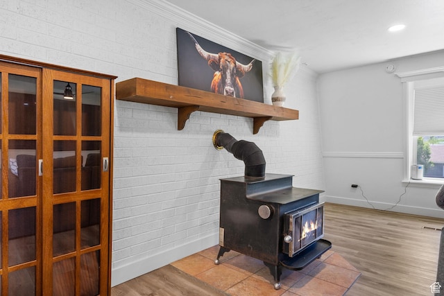 993 E 12600 S, Draper, UT 84020 - detailed view of a wood stove, baseboards, wood finished floors, and recessed lighting