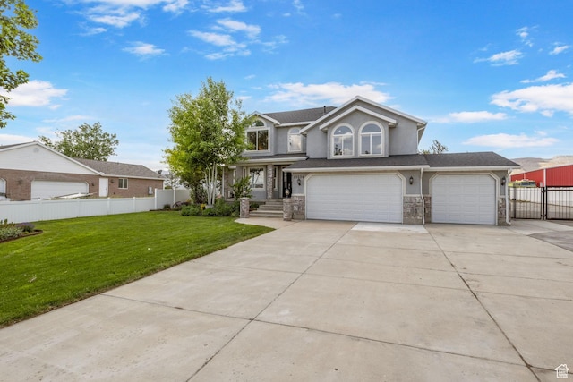 13226 S Cocomo Ct W, Herriman, UT 84096 - traditional-style home with driveway, stone siding, an attached garage, and stucco siding