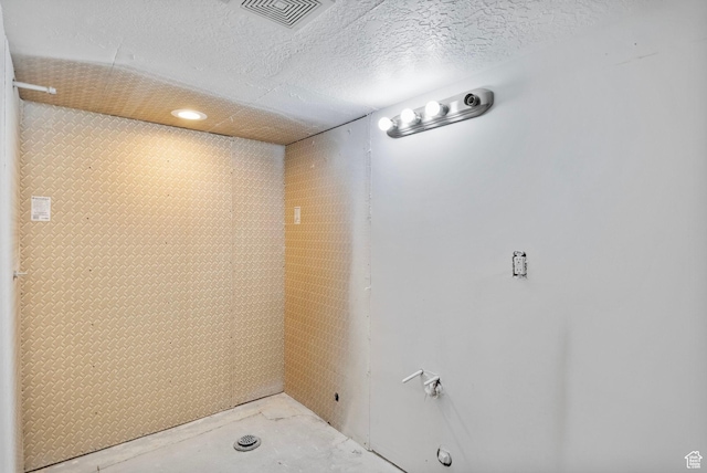 13226 S Cocomo Ct W, Herriman, UT 84096 - detailed view of unfinished concrete flooring and a textured ceiling